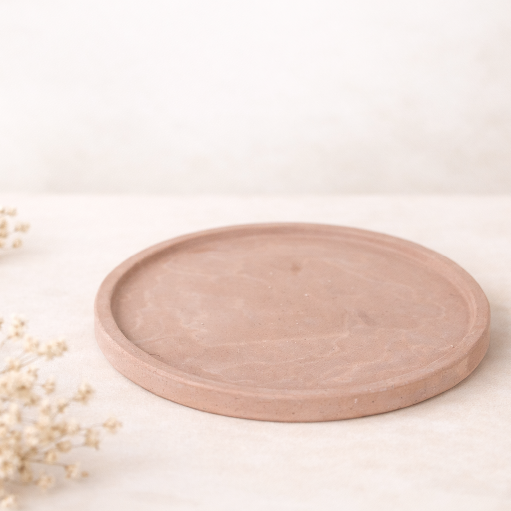 kulaty podtacek staroruzovy na svetlem pozadi